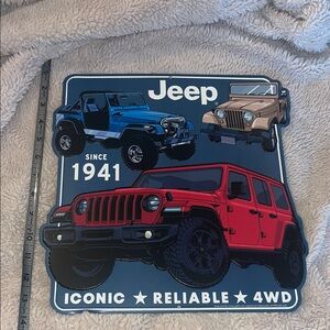 Jeep Metal Sign with Red, Blue, and Tan Vehicles